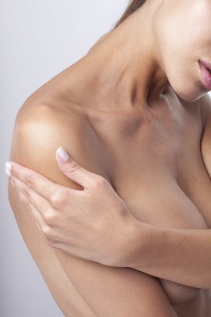 What are the pros and cons of breast lift surgery with implants? 