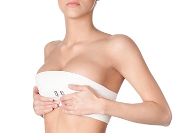 Aligning asymmetrical breasts after breast augmentation surgery